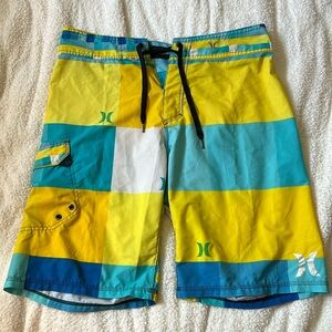 Blue and yellow Hurley board shorts. 31 waist & 10.5” inseam